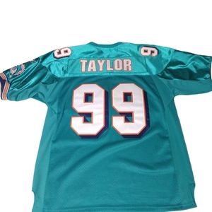 NFL authentic Jason Taylor #99 jersey.  Used in excellent condition.
